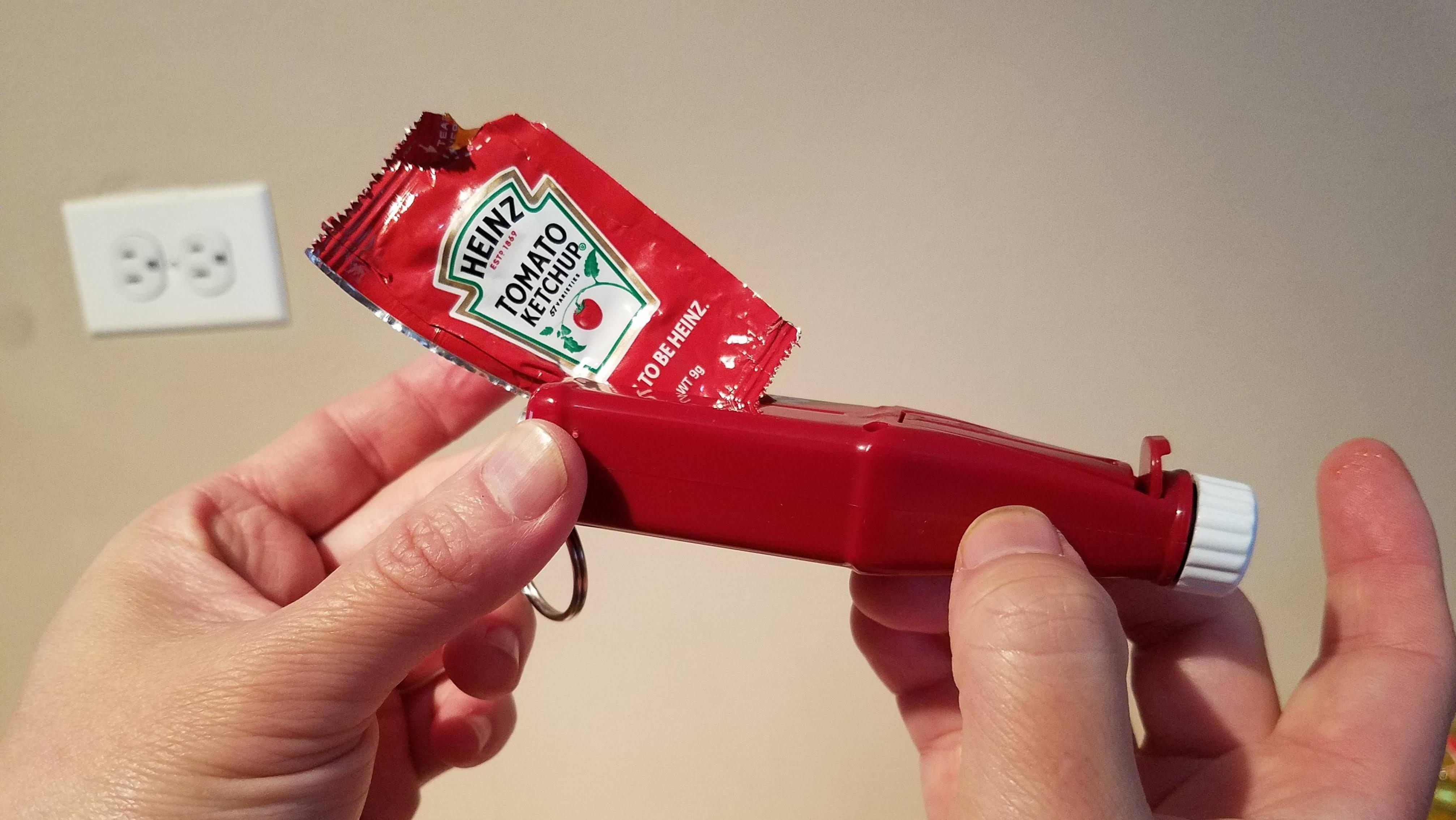 Spent ketchup packet in Heinz Packet Roller