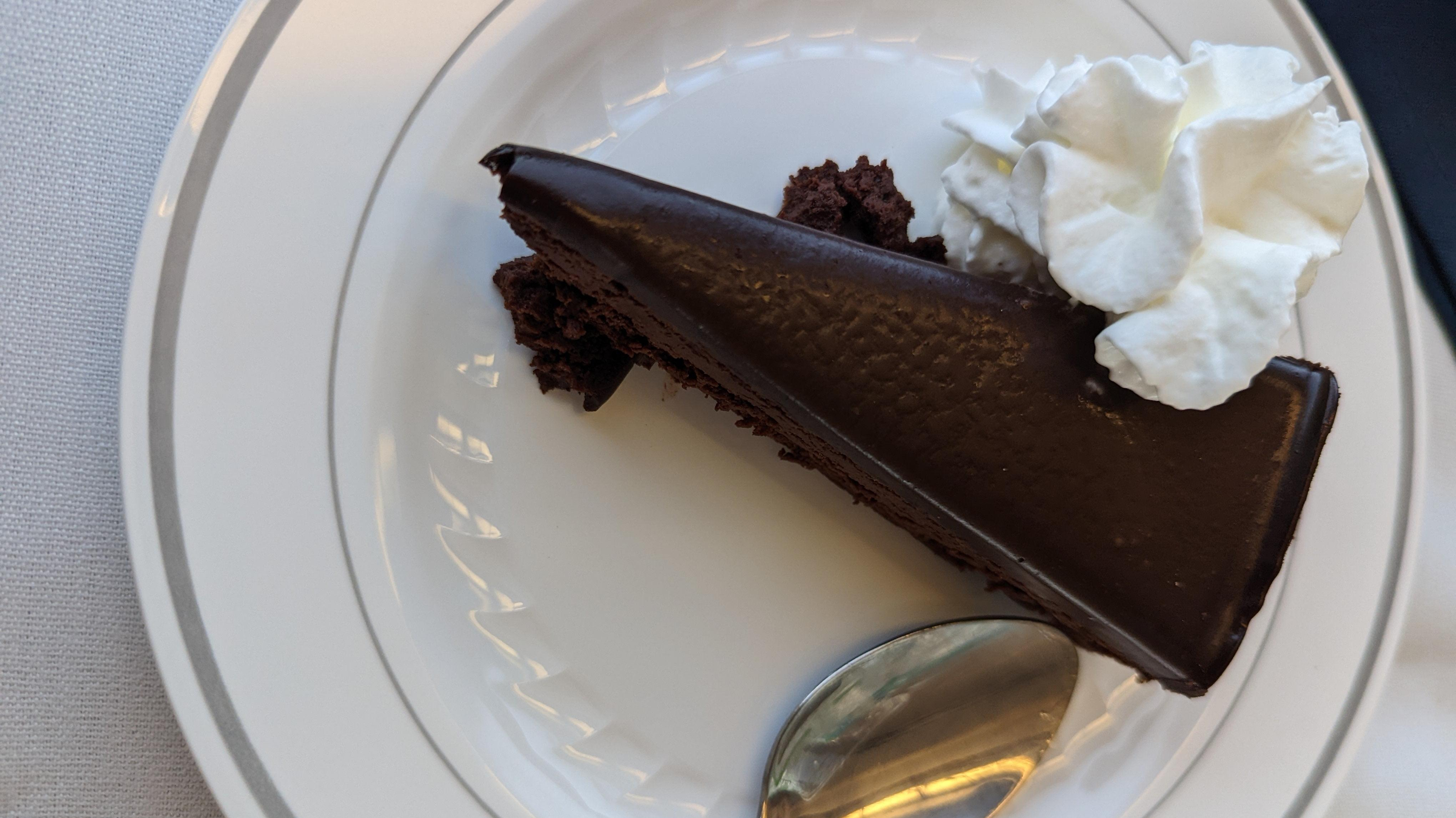 Chocolate mousse cake with whipped cream