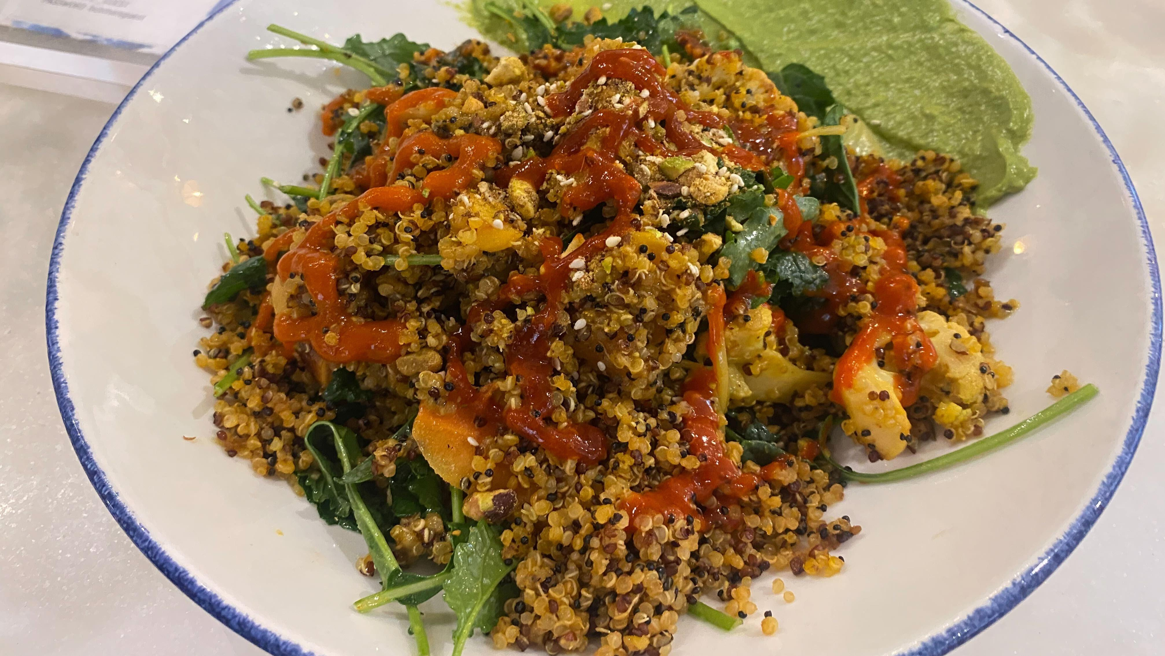 Quinoa bowl with three sriracha brands applied