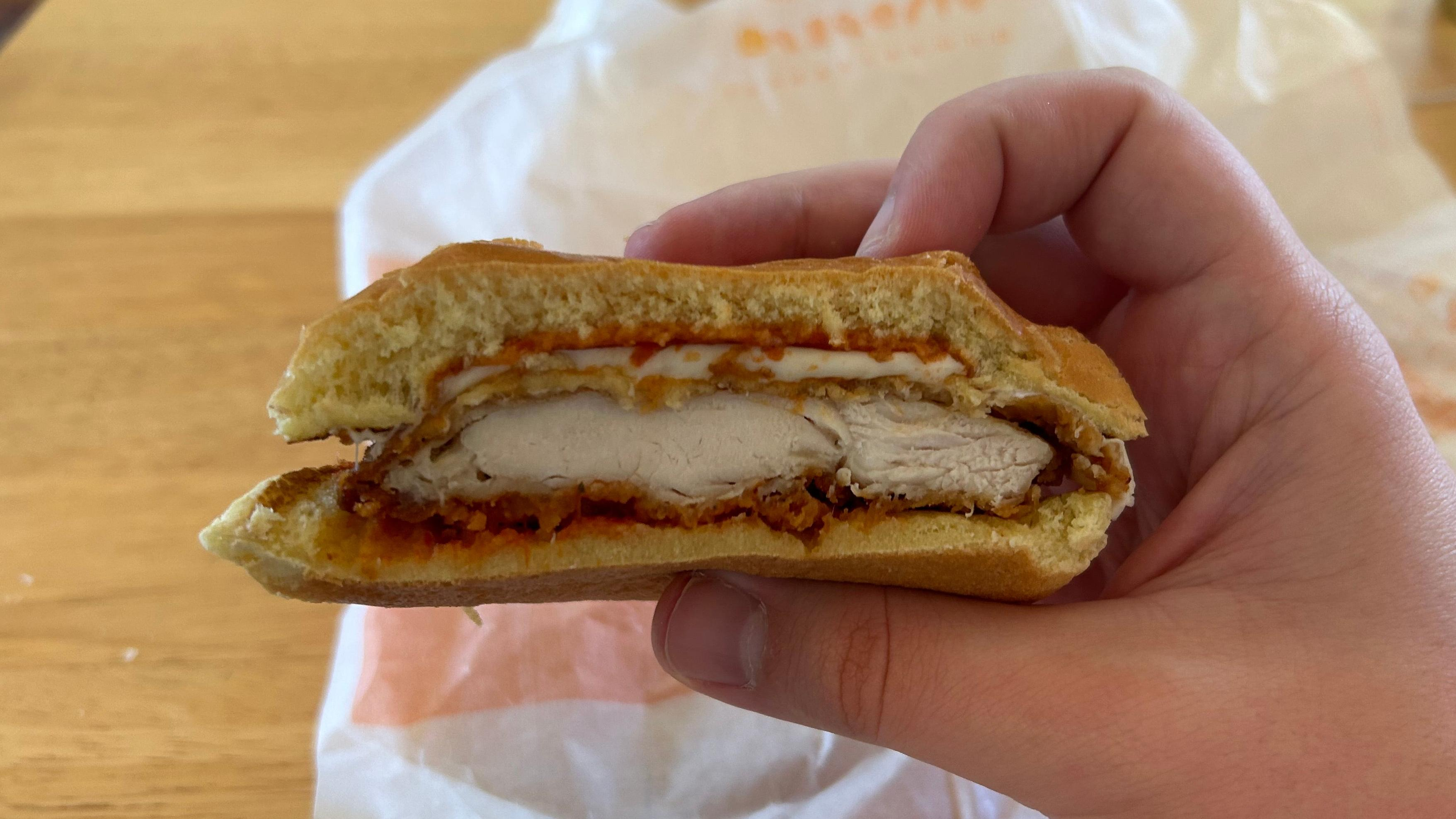 Burger King's Royal Italian Crispy Chicken Sandwich in cross-section