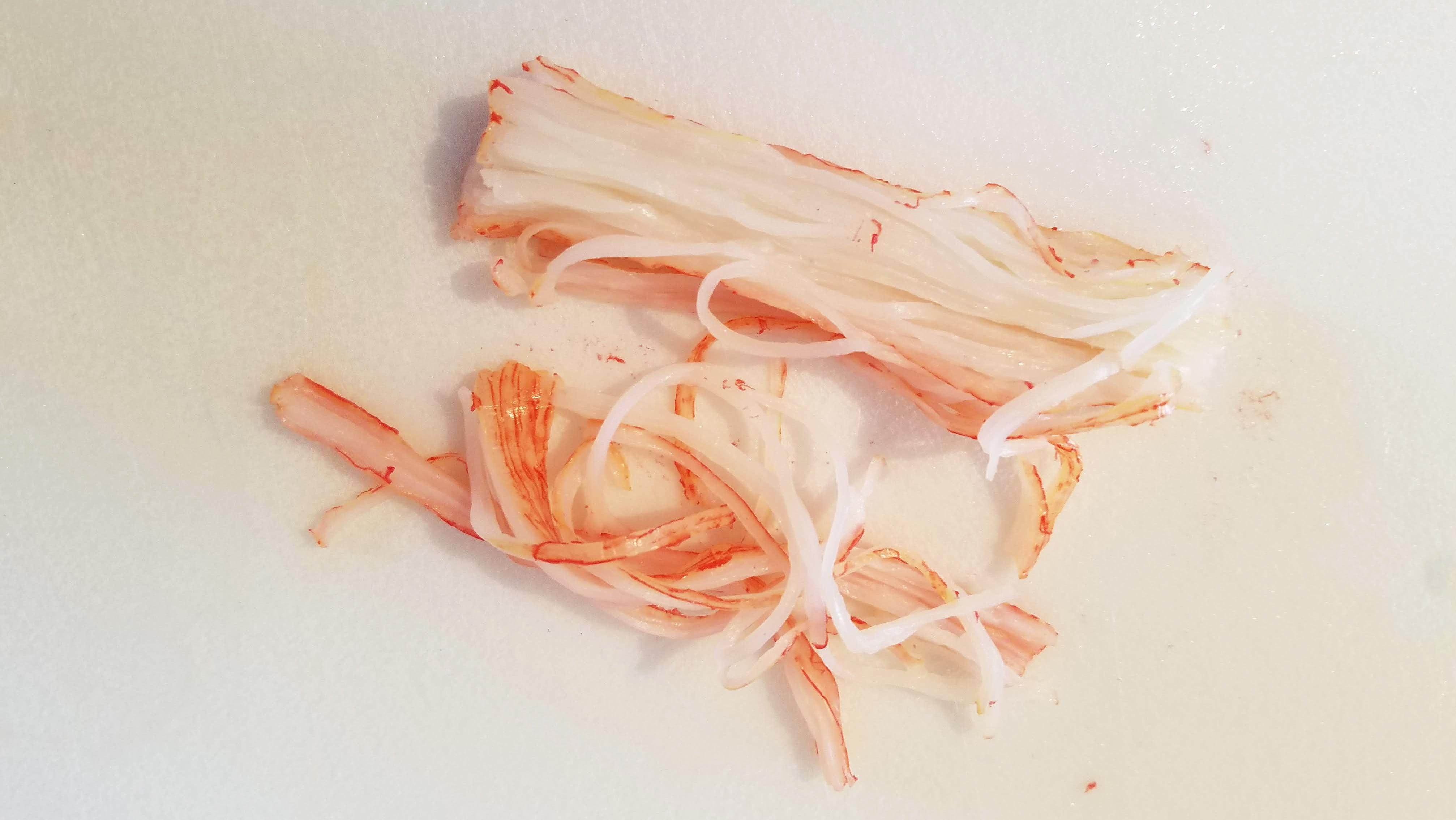 A shredded crab stick, with long strings pulled out