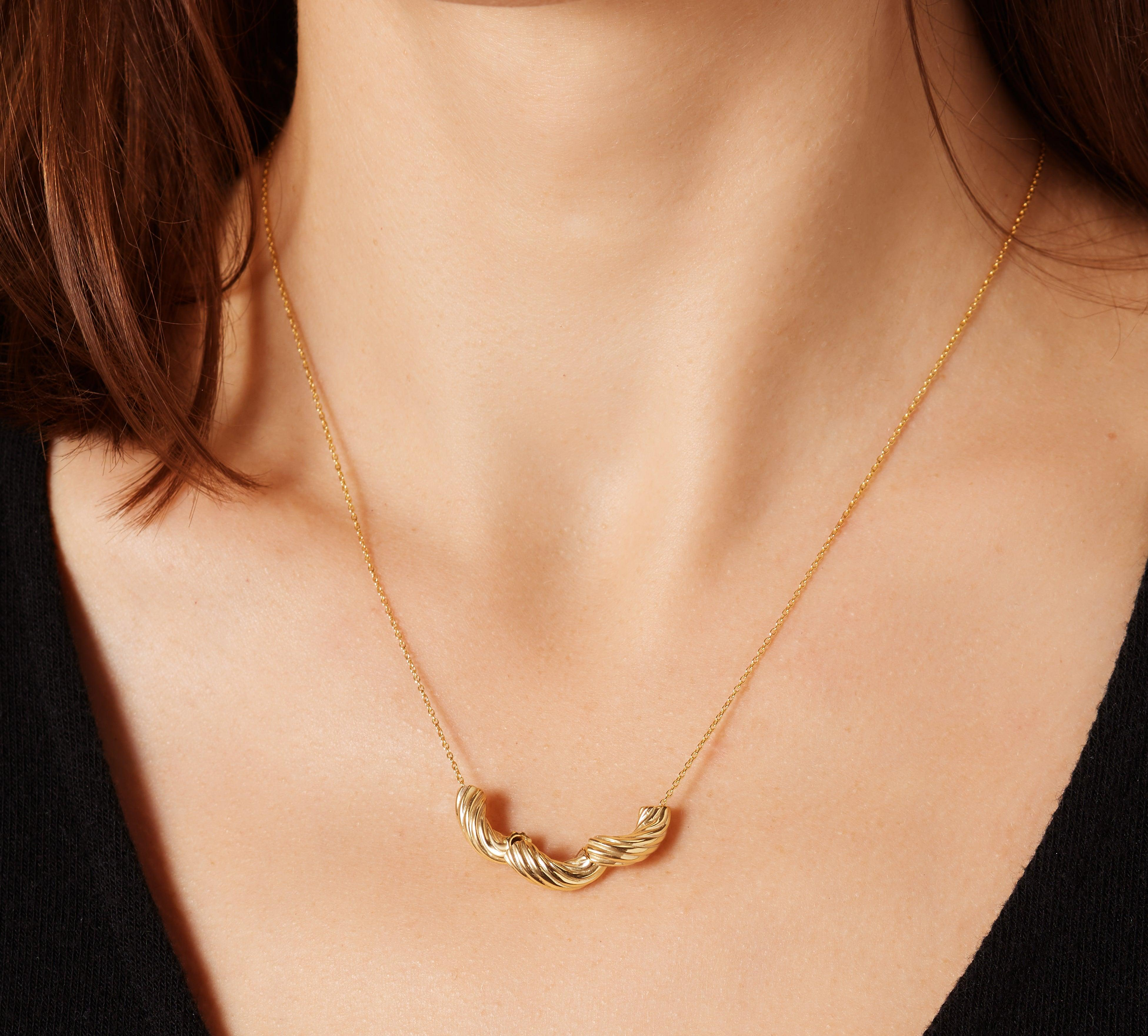 Photo of Panera gold necklace with three gold noodles