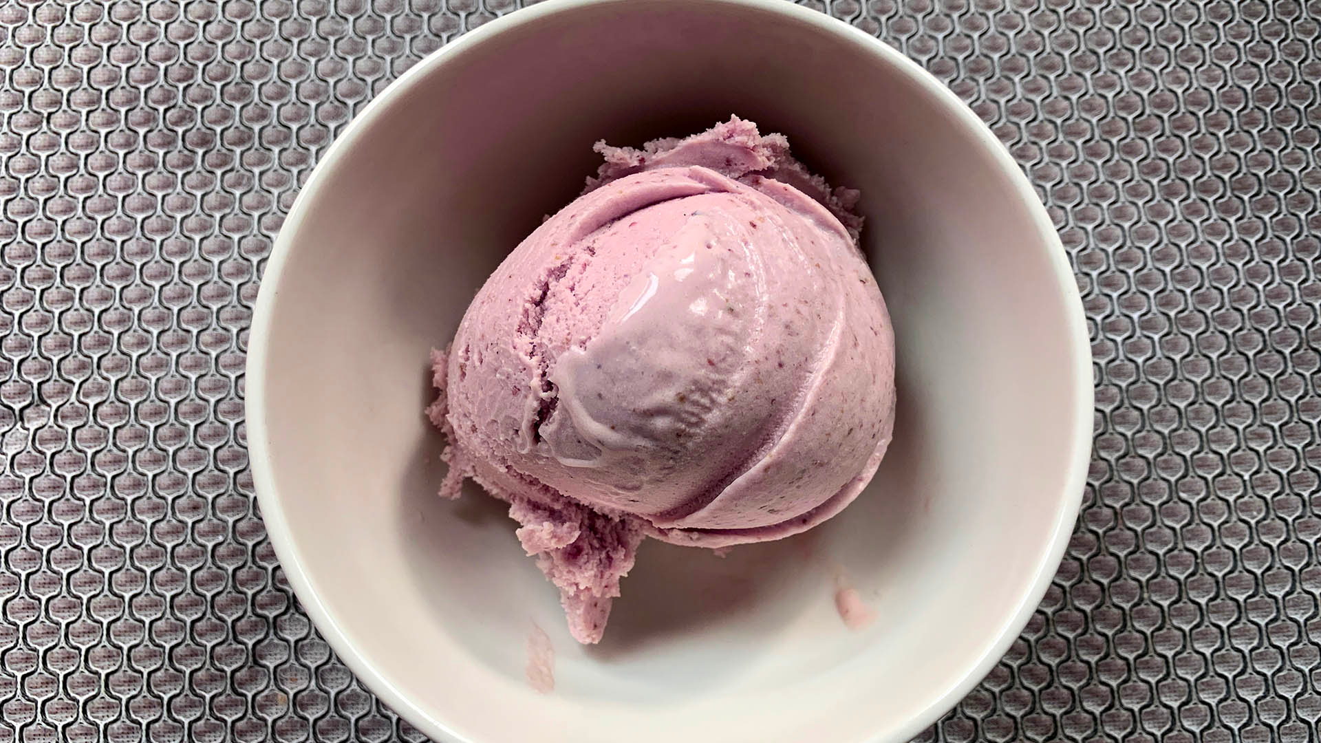 a scoop of raspberry ice cream