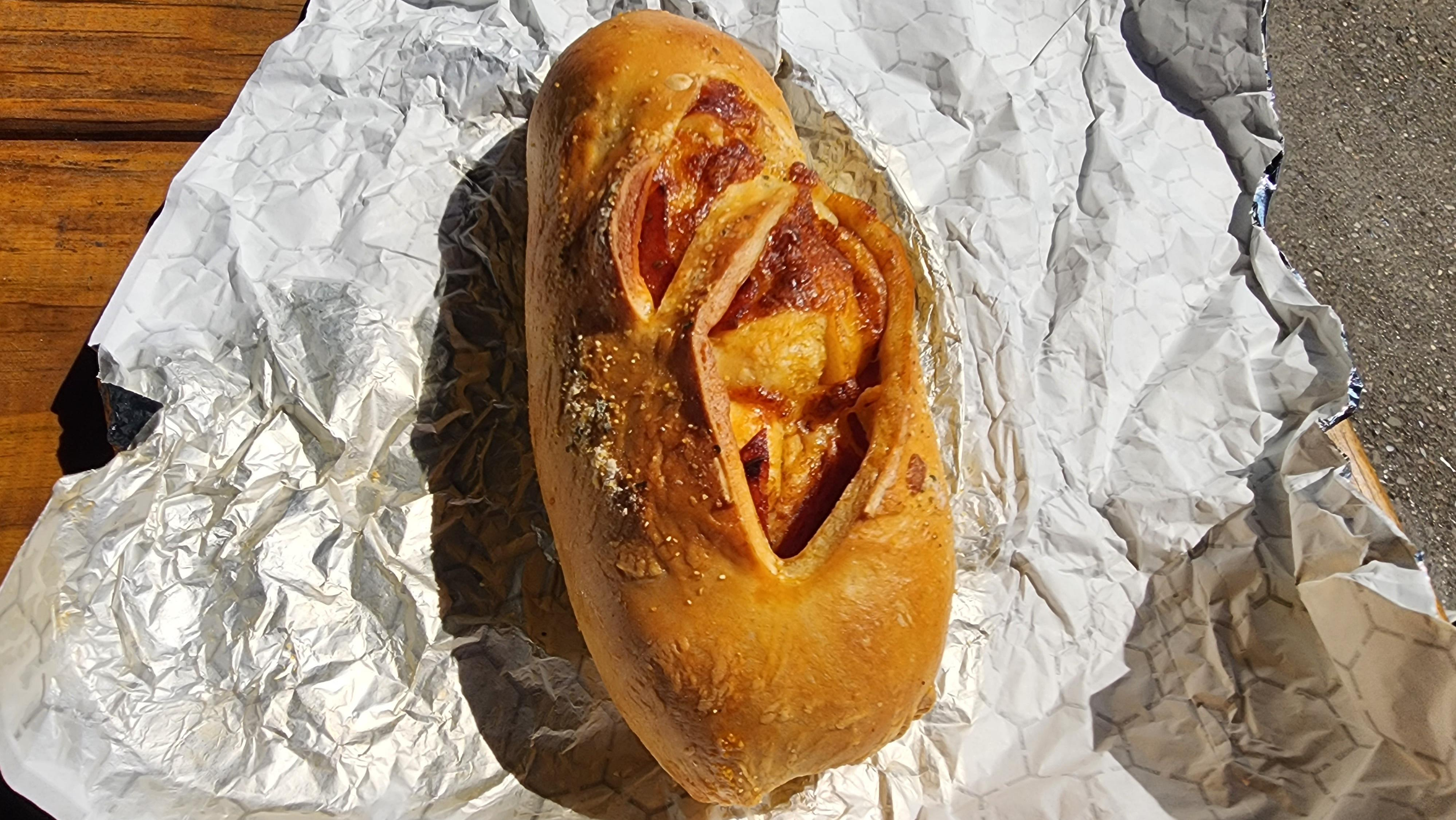 Pepperoni roll sitting on foil