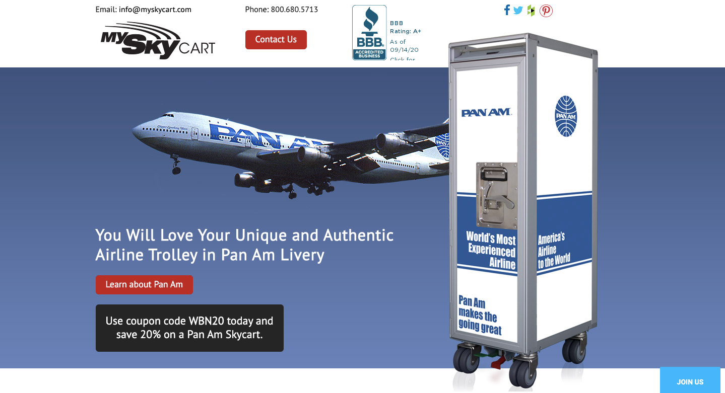 Website homepage displaying Pan Am drinks trolley with text, 