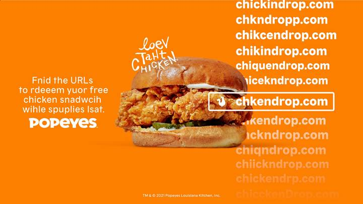 product shot of Popeyes chicken sandwich with various misspelled domain names