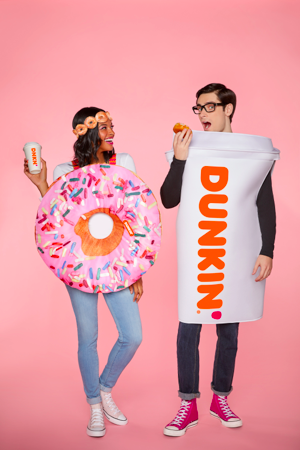 Man and woman in Dunkin' costumes