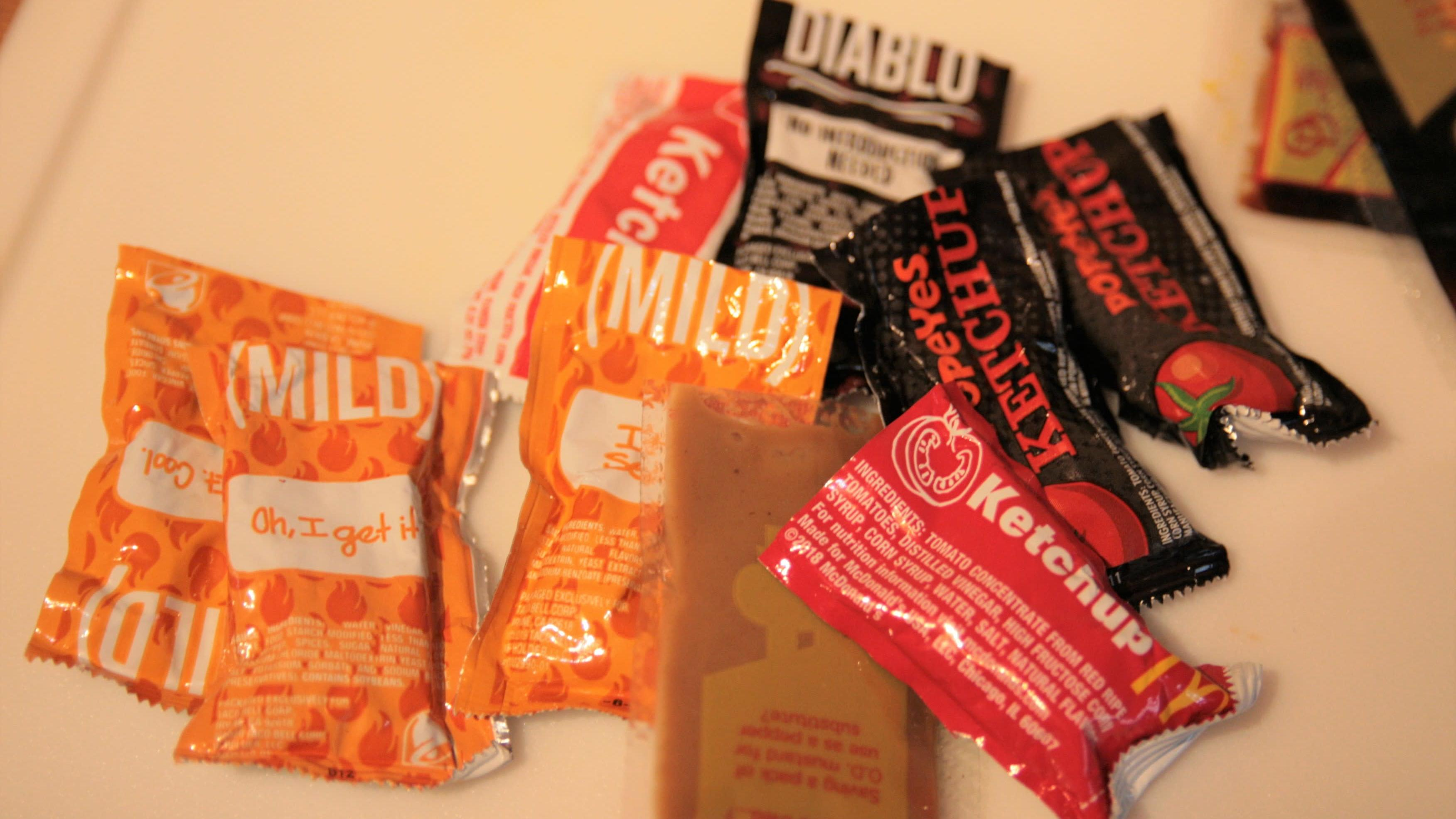 opened condiment packets
