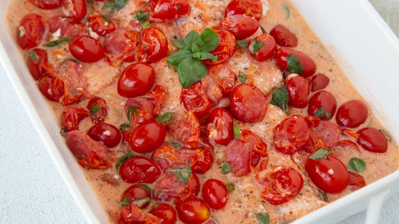 salmon with burst tomatoes and basil