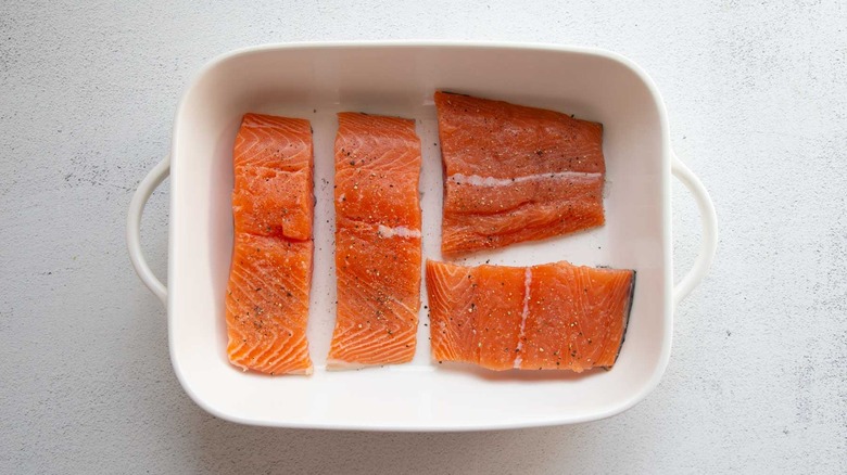 salmon filets in a baking dish