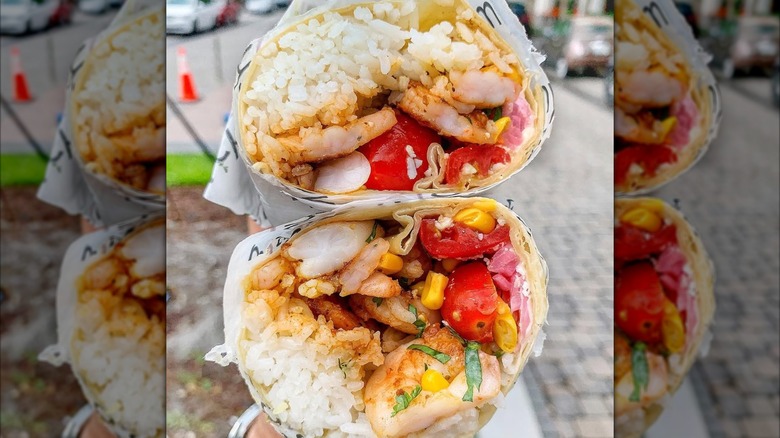 Seafood burrito cut in half