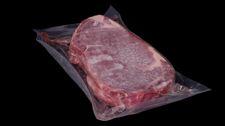 Frozen vacuum-sealed steak