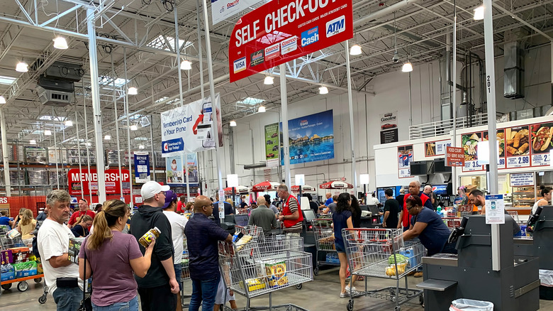 People at checkout at Costco