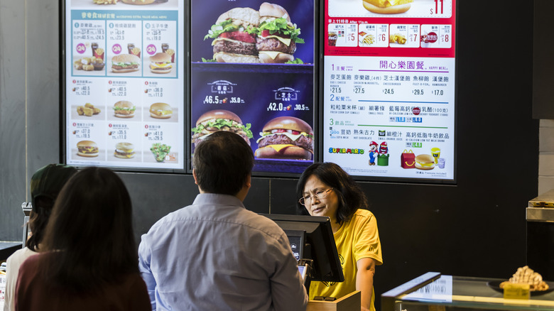 Customers line up to place their orders at a McDonald's in Hong Kong