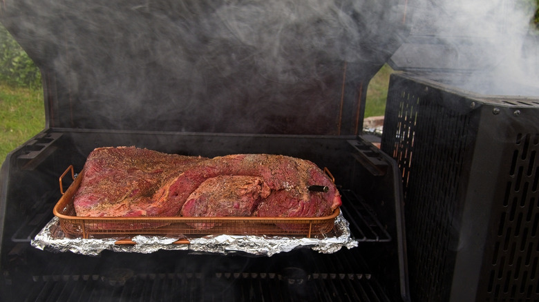 Brisket inside a smoker