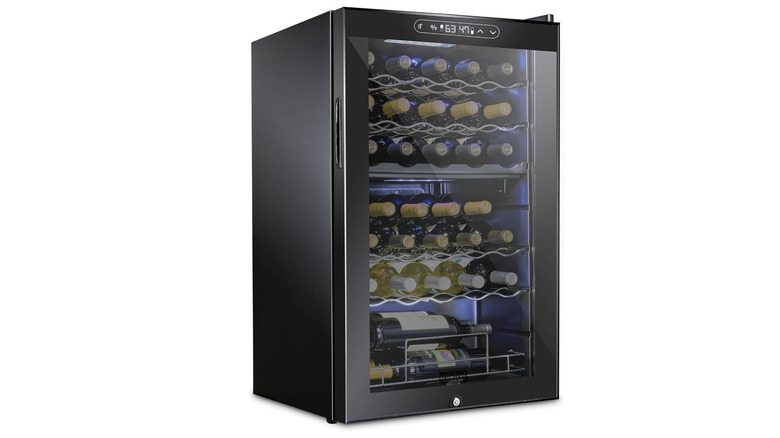 Schmecke wine cooler refrigerator filled with bottles