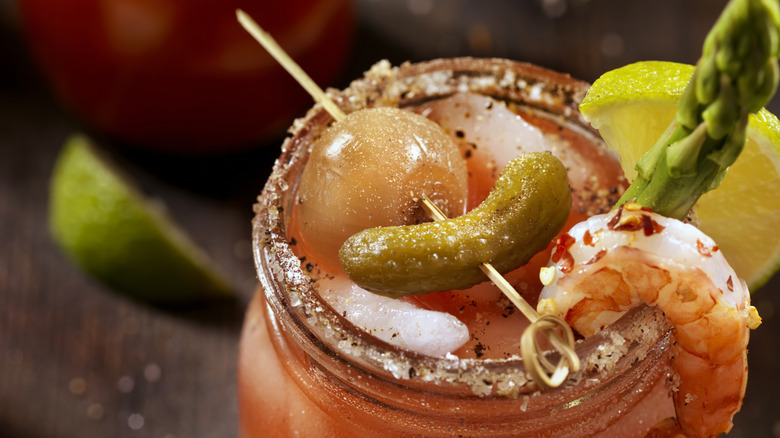 Bloody mary cocktail with garnishes