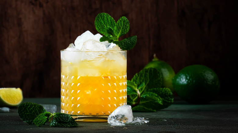 A mai tai cocktail topped with a sprig of mint