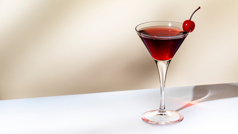 A Manhattan cocktail served in a martini glass