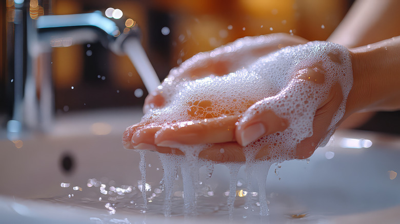 Person washing their hands