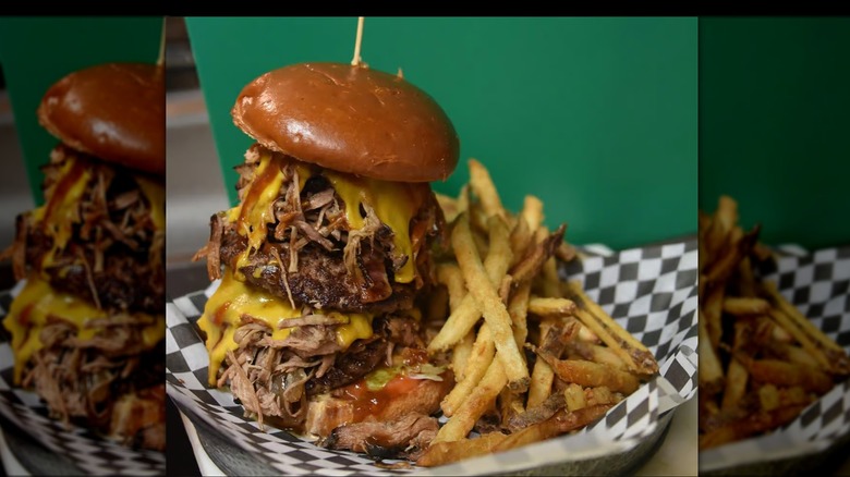 Godfather Burger on plate with crispy fries