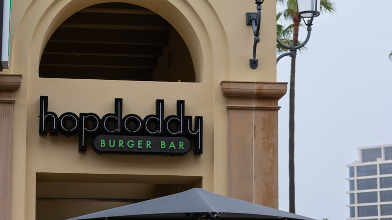 A sign for Hopdoddy burger bar