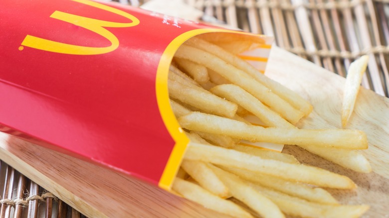 Lightly packed box of McDonald's fries on its side