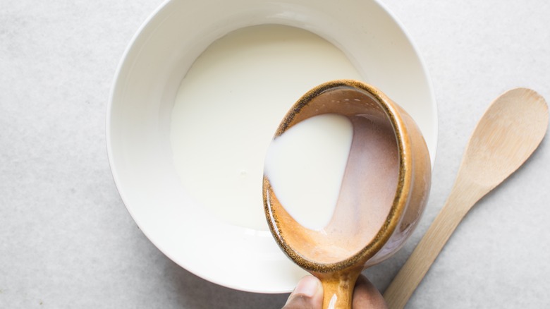 canned evaporated milk in bowl