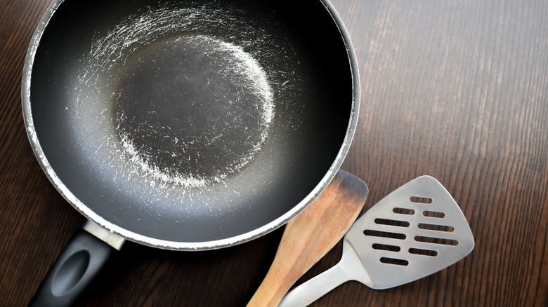 Scratched nonstick pan and spatulas