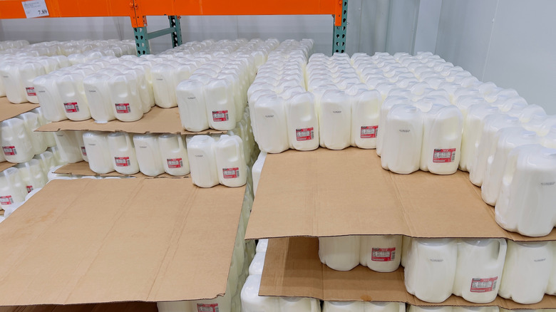 Stacks of milk on Costco shelf