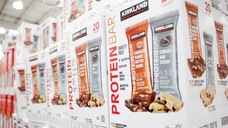 Kirkland Protein Bar boxes stacked in store