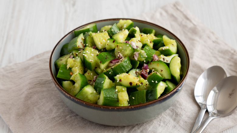 Cucumber salad plated in a bowl