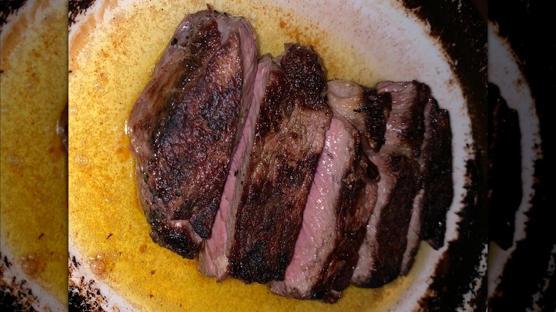 Basting steak in butter