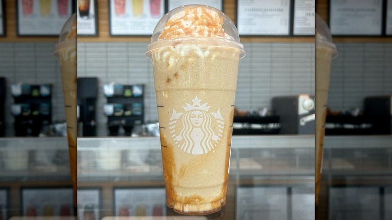 A Starbucks Caramel Ribbon Crunch Frappuccino on a counter