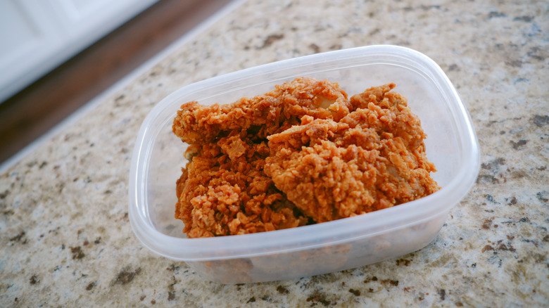 fried chicken in leftover container