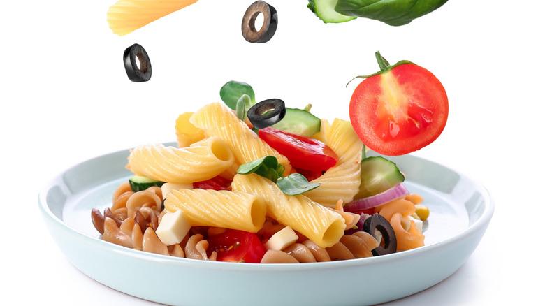 Pasta salad with falling ingredients