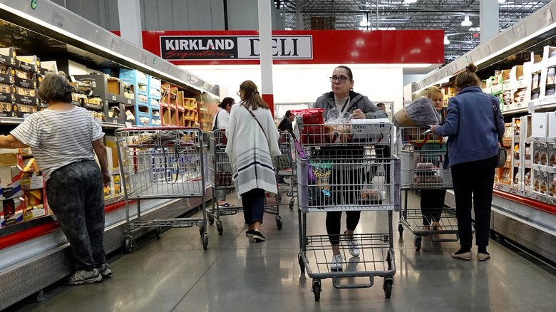 Shoppers perusing foods at Costco