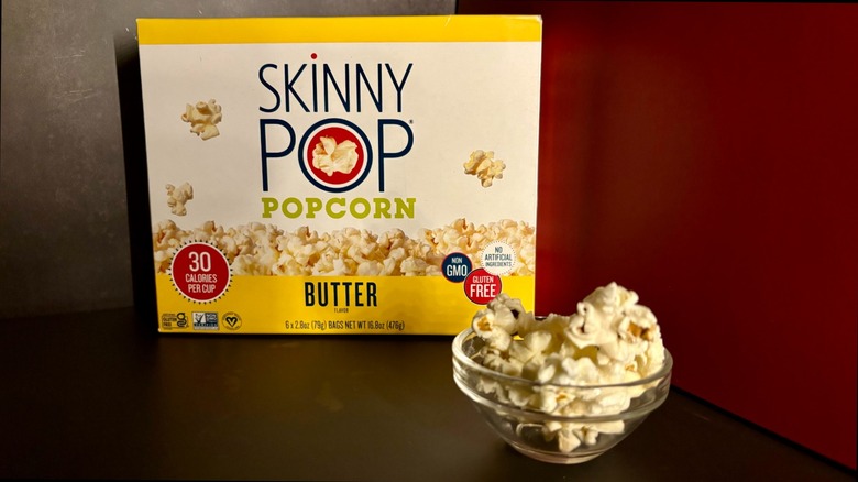 SkinnyPOP Butter Microwave box with popcorn in clear ramekin