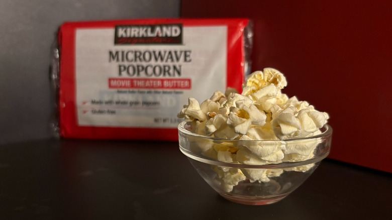 Kirkland Signature popcorn box and popcorn in clear ramekin