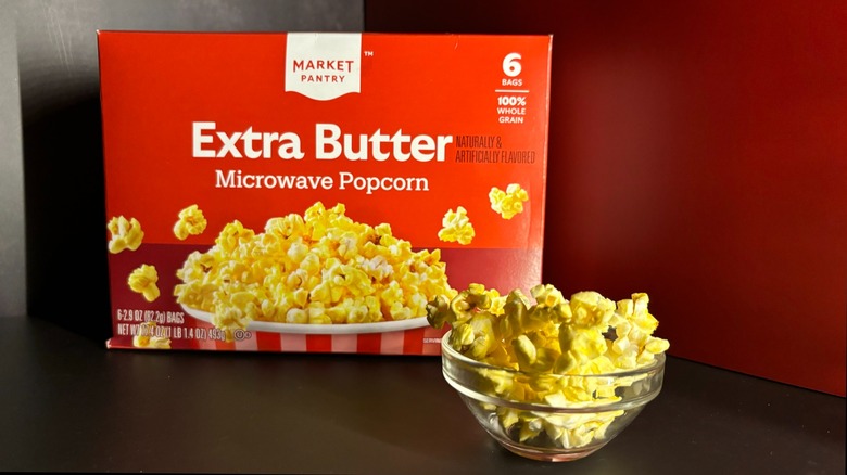 Market Pantry Extra Butter popcorn box and popcorn in clear ramekin