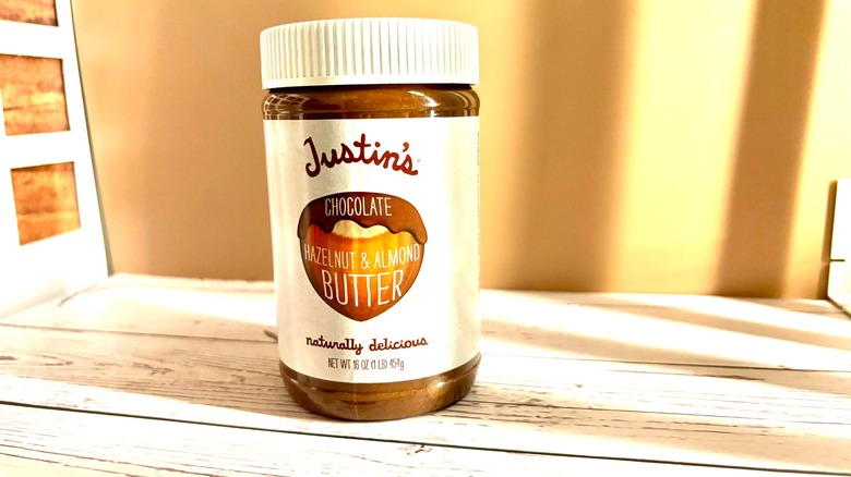 Justin's Chocolate Hazelnut and Almond Butter jar on table