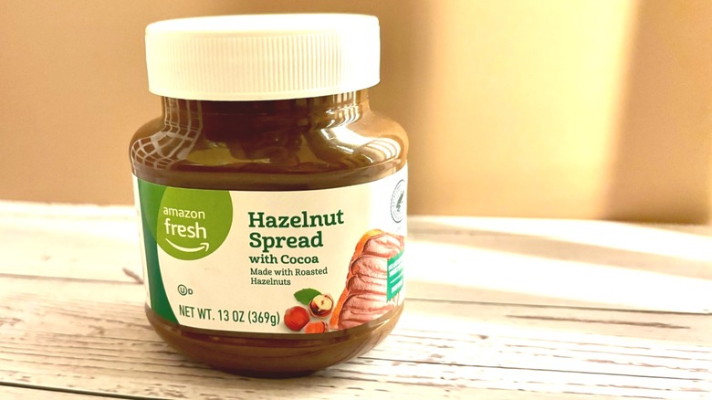 Amazon Fresh Hazelnut Spread jar on table