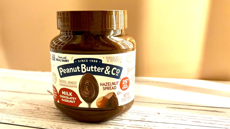 Peanut Butter & Co Milk Chocolatey Hazelnut Spread jar on table