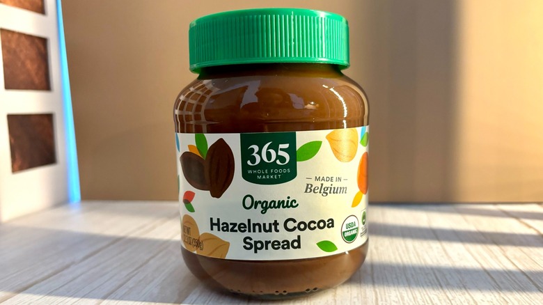 365 by Whole Foods Market Organic Hazelnut Cocoa Spread jar on table