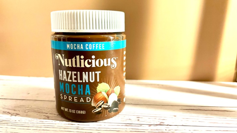 Nutlicious Hazelnut Mocha Spread jar on table