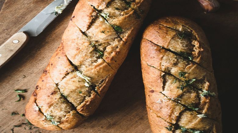 Sliced garlic bread with ingredients