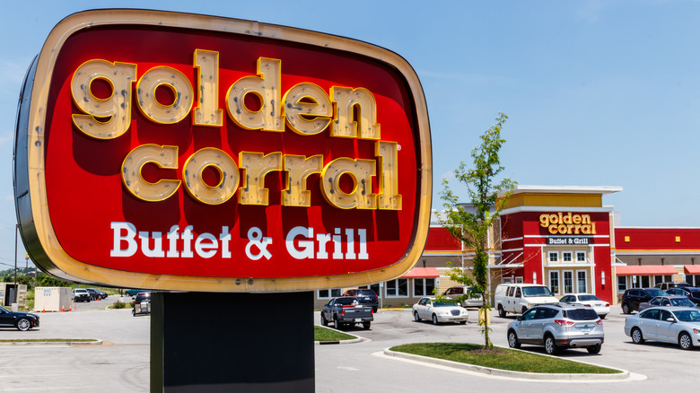 Outside of Golden Corral restaurant with sign in foreground