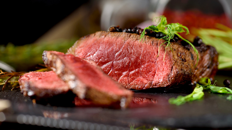 Close-up of a very rare steak sliced to show the center