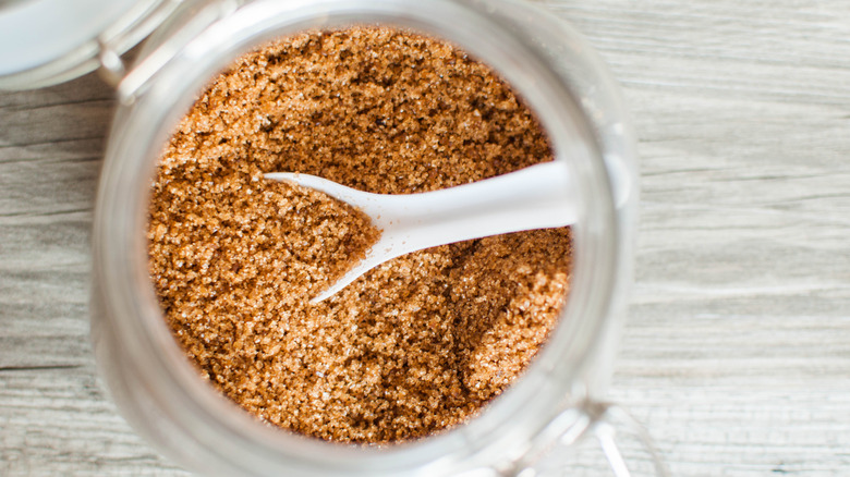 Spoon in jar of brown sugar