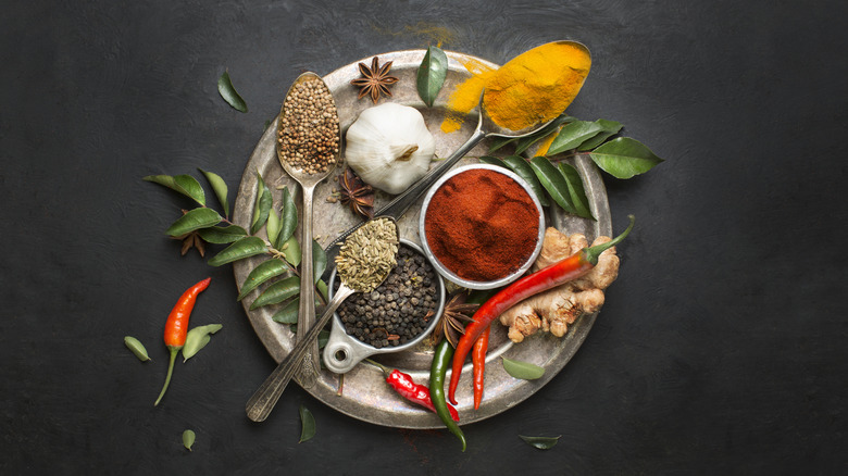 Various herbs and spices on a plate